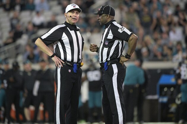 Referee Brad Allen, left, and umpire Barry Anderson (20) talk on the field during the second half of an NFL football game against the Indianapolis Colts Sunday, Dec. 29, 2019, in Jacksonville, Fla. (AP Photo/Phelan M. Ebenhack) Referee Brad Allen, left, and umpire Barry Anderson (20) talk on the field during the second half of an NFL football game against the Indianapolis Colts Sunday, Dec. 29, 2019, in Jacksonville, Fla. (AP Photo/Phelan M. Ebenhack)