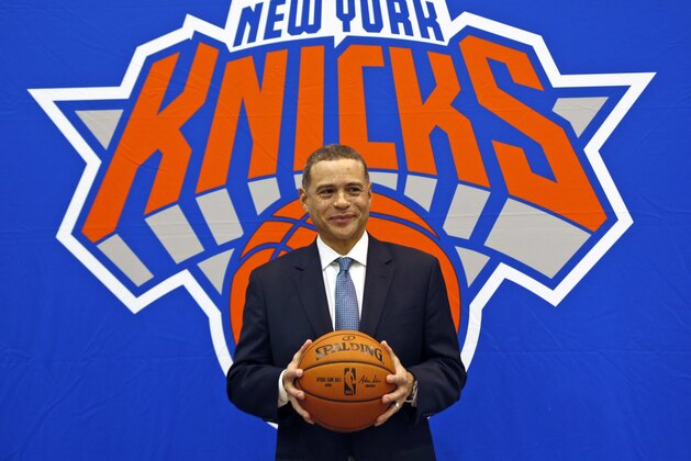New York Knicks general manager Scott Perry poses for a picture after a news conference in Greenburgh, N.Y., Monday, July 17, 2017. (AP Photo/Seth Wenig)