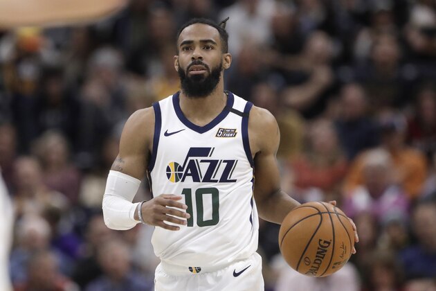 Utah Jazz guard Mike Conley (10) brings the ball up court in the second half during an NBA basketball game against the Sacramento Kings Saturday, Jan. 18, 2020, in Salt Lake City. (AP Photo/Rick Bowmer)