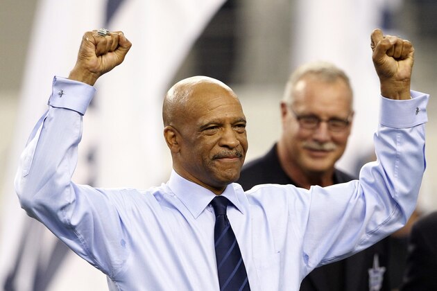 FILE - In this Nov. 6, 2011, file photo, former Dallas Cowboys player Drew Pearson reacts during an induction ceremony into the Cowboys Ring of Honor at halftime of an NFL football game against the Seattle Seahawks  in Arlington, Texas. Former Dallas Cowboys wide receiver Drew Pearson was selected Tuesday, Aug. 18, 2020, as the Senior Finalist for the Pro Football Hall of Fameâ€™s Class of 2021.  (AP Photo/Jim Cowsert)