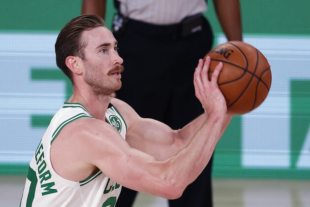 Boston Celtics' Gordon Hayward shoots the ball during the second half of an NBA basketball game against the Memphis Grizzlies Tuesday, Aug. 11, 2020, in Lake Buena Vista, Fla. (AP Photo/Mike Ehrmann, Pool)