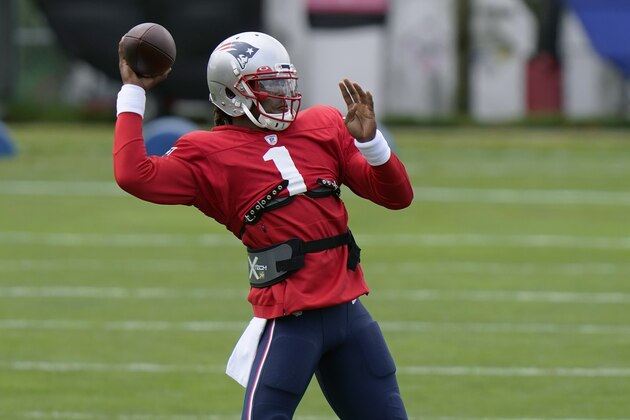 New England Patriots quarterback Cam Newton passes during an NFL football camp practice, Monday, Aug. 17, 2020, in Foxborough, Mass. (AP Photo/Steven Senne, Pool) New England Patriots quarterback Cam Newton passes during an NFL football camp practice, Monday, Aug. 17, 2020, in Foxborough, Mass. (AP Photo/Steven Senne, Pool)