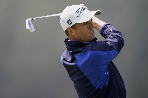 Justin Thomas watches his tee shot on the 17th hole during the third round of the PGA Championship golf tournament at TPC Harding Park Saturday, Aug. 8, 2020, in San Francisco. (AP Photo/Charlie Riedel)
