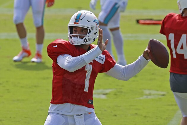 Miami Dolphins quarterback Tua Tagovailoa (1) throws the ball during an NFL football training camp practice in Davie, Fla., Monday, Aug. 17, 2020. (AP Photo/Joel Auerbach)