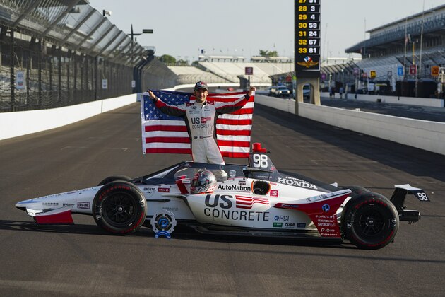 Marco Andretti poses during the front row photos session for the Indianapolis 500 auto race at Indianapolis Motor Speedway in Indianapolis, Monday, Aug. 17, 2020. Andretti won the pole for Sunday's race. (AP Photo/Michael Conroy)