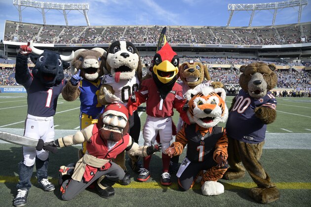 Team mascots pose on the sideline before the NFL Pro Bowl football game between the AFC and the NFC Sunday, Jan. 26, 2020 in Orlando, Fla. (AP Photo/Phelan M. Ebenhack)