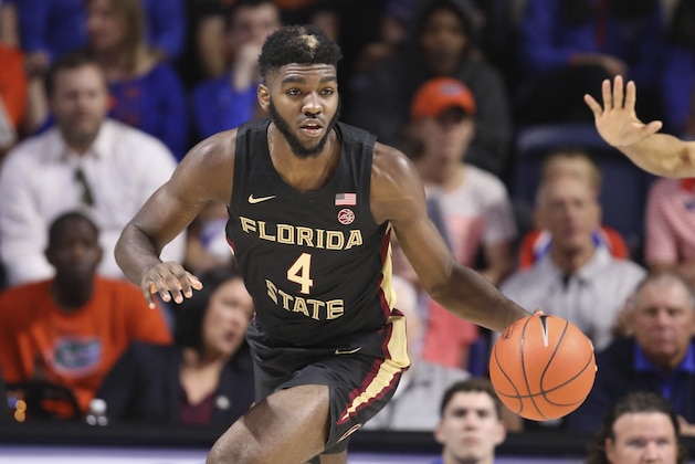 Florida State forward Patrick Williams (4) dribbles up court against Florida during the first half of an NCAA college basketball game Sunday, Nov. 10, 2019, in Gainesville, Fla. (AP Photo/Matt Stamey)