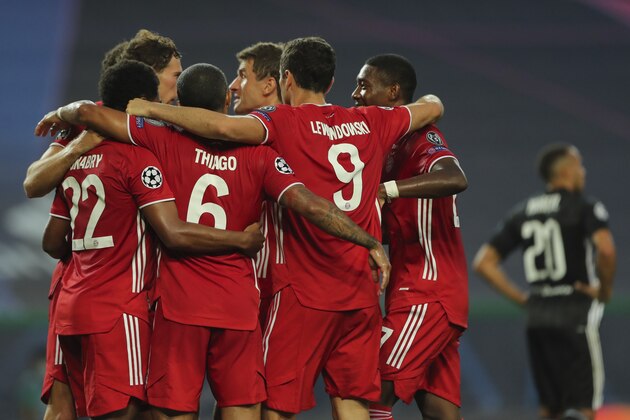 Bayern players celebrate the second goal of their team during the Champions League semifinal soccer match between Lyon and Bayern Munich at the Jose Alvalade stadium in Lisbon, Portugal, Wednesday, Aug. 19, 2020. (Miguel A. Lopes/Pool via AP) Bayern players celebrate the second goal of their team during the Champions League semifinal soccer match between Lyon and Bayern Munich at the Jose Alvalade stadium in Lisbon, Portugal, Wednesday, Aug. 19, 2020. (Miguel A. Lopes/Pool via AP)