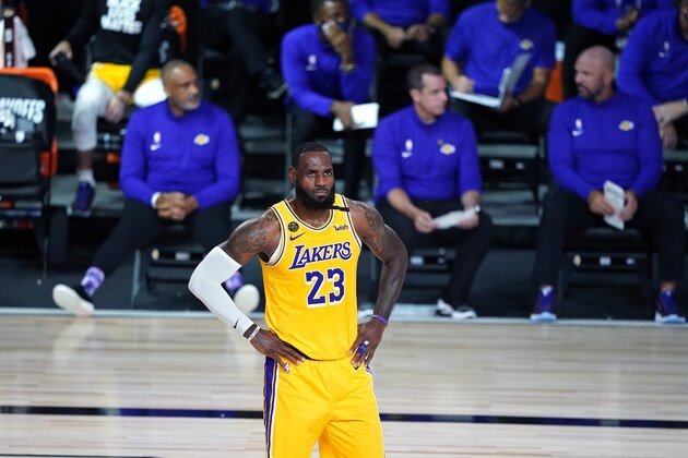 Los Angeles Lakers forward LeBron James (23) walks on the court during the second half of an NBA basketball game against the Portland Trail Blazers Tuesday, Aug. 18, 2020, in Lake Buena Vista, Fla. (AP Photo/Ashley Landis, Pool)
