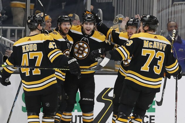 Boston Bruins' David Krejci, second from left, celebrates his 200th career goal with teammates during the third period of an NHL hockey game against the Carolina Hurricanes in Boston, Tuesday, Dec. 3, 2019. (AP Photo/Michael Dwyer) Boston Bruins' David Krejci, second from left, celebrates his 200th career goal with teammates during the third period of an NHL hockey game against the Carolina Hurricanes in Boston, Tuesday, Dec. 3, 2019. (AP Photo/Michael Dwyer)