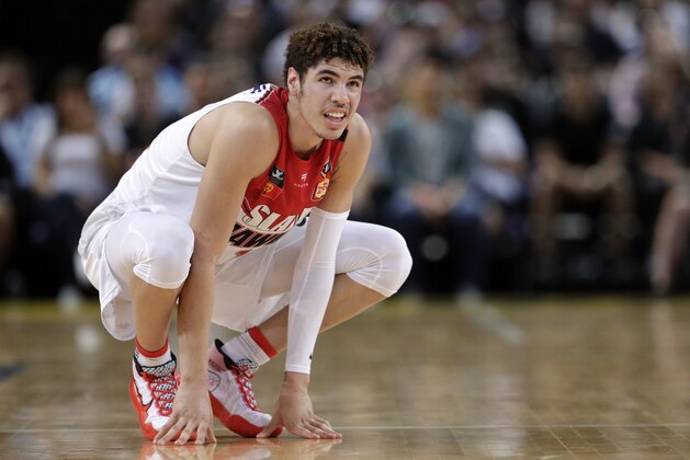 LaMelo Ball of the Illawarra Hawks squats during their game against the Sydney Kings in the Australian Basketball League in Sydney, Sunday, Nov. 17, 2019. (AP Photo/Rick Rycroft)