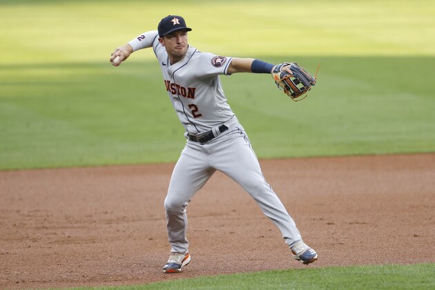 Houston Astros third baseman Alex Bregman throws to first base to put out Colorado Rockies' Trevor Story in the first inning of a baseball game Wednesday, Aug. 19, 2020, in Denver. (AP Photo/David Zalubowski) Houston Astros third baseman Alex Bregman throws to first base to put out Colorado Rockies' Trevor Story in the first inning of a baseball game Wednesday, Aug. 19, 2020, in Denver. (AP Photo/David Zalubowski)