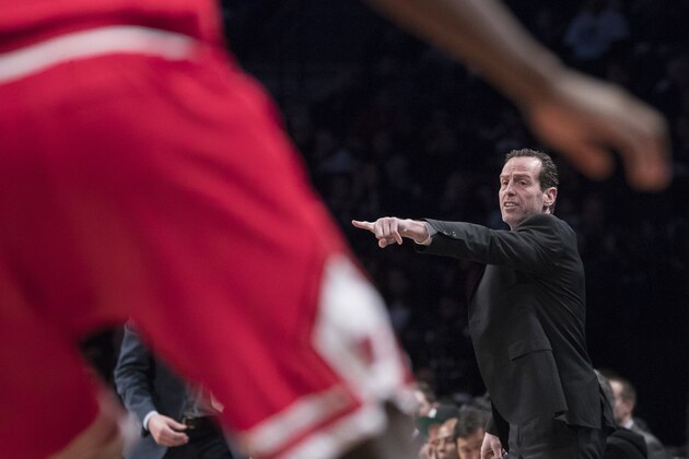 Brooklyn Nets head coach Kenny Atkinson gestures during the first half of his team's NBA basketball game against the Chicago Bulls, Saturday, April 8, 2017, in New York. (AP Photo/Mary Altaffer)