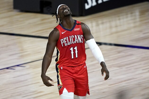 New Orleans Pelicans' Jrue Holiday reacts during the first half of an NBA basketball game against the Sacramento Kings Thursday, Aug. 6, 2020 in Lake Buena Vista, Fla. (AP Photo/Ashley Landis, Pool)