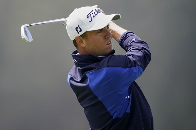 Justin Thomas watches his tee shot on the 17th hole during the third round of the PGA Championship golf tournament at TPC Harding Park Saturday, Aug. 8, 2020, in San Francisco. (AP Photo/Charlie Riedel)