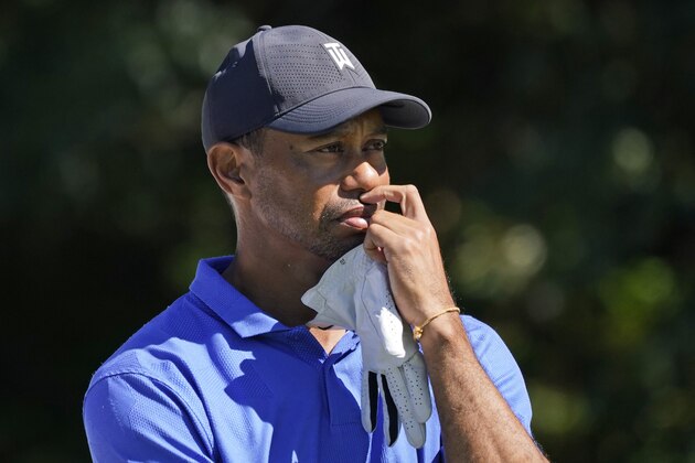 Tiger Woods waits to hit on the 16th tee in the first round of the Northern Trust golf tournament at TPC Boston, Thursday, Aug. 20, 2020, in Norton, Mass. (AP Photo/Charles Krupa)