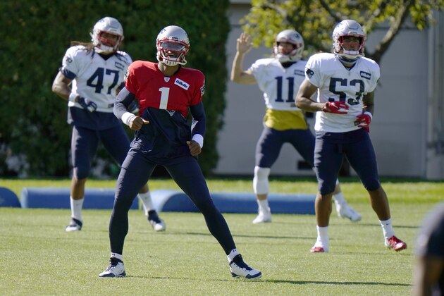 New England Patriots fullback Jakob Johnson (47), quarterback Cam Newton (1) wide receiver Julian Edelman (11) and tight end Devin Asiasi (53) stretch during an NFL football training camp practice, Thursday, Aug. 20, 2020, in Foxborough, Mass. (AP Photo/Steven Senne, Pool)