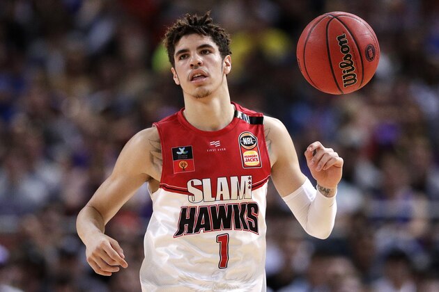 LaMelo Ball of the Illawarra Hawks brings the ball up during their game against the Sydney Kings in the Australian Basketball League in Sydney, Sunday, Nov. 17, 2019. (AP Photo/Rick Rycroft)