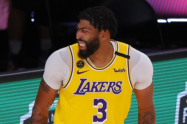 Los Angeles Lakers' Anthony Davis reacts after coming down on his ankle during the third quarter of Game 2 of an NBA basketball first-round playoff series against the Portland Trail Blazers, Thursday, Aug. 20, 2020, in Lake Buena Vista, Fla. (Kevin C. Cox/Pool Photo via AP) Los Angeles Lakers' Anthony Davis reacts after coming down on his ankle during the third quarter of Game 2 of an NBA basketball first-round playoff series against the Portland Trail Blazers, Thursday, Aug. 20, 2020, in Lake Buena Vista, Fla. (Kevin C. Cox/Pool Photo via AP)