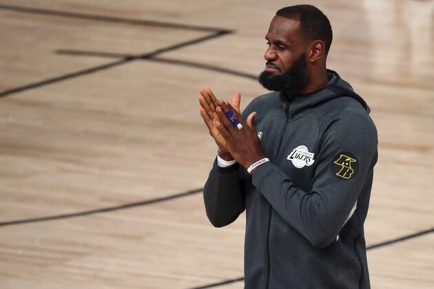 Los Angeles Lakers forward LeBron James warms up before of Game 2 of an NBA basketball first-round playoff series against the Portland Trail Blazers, Thursday, Aug. 20, 2020, in Lake Buena Vista, Fla. (Kim Klement/Pool Photo via AP) Los Angeles Lakers forward LeBron James warms up before of Game 2 of an NBA basketball first-round playoff series against the Portland Trail Blazers, Thursday, Aug. 20, 2020, in Lake Buena Vista, Fla. (Kim Klement/Pool Photo via AP)