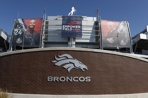 The logo and sign for Empower Field at Mile High hangs on the south stands of Mile High Stadium during a news conference to announce Empower's 21-year deal with the Denver Broncos for the naming rights to the NFL football team's stadium Thursday, Sept. 5, 2019, in Denver. Empower, which is based in the Denver suburb of Greenwood Village, is the second-largest provider of retirement plans in the United States. (AP Photo/David Zalubowski)