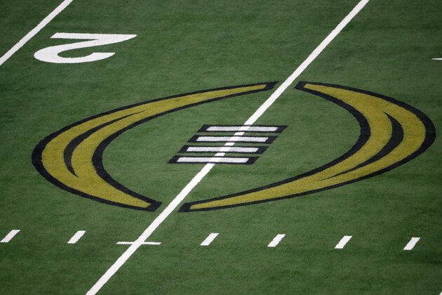 The College Football Championship Playoff logo is shown on the field at AT&T Stadium during the NCAA Cotton Bowl semi-final playoff football game between Clemson and Notre Dame on Saturday, Dec. 29, 2018, in Arlington, Texas. (AP Photo/Roger Steinman) The College Football Championship Playoff logo is shown on the field at AT&T Stadium during the NCAA Cotton Bowl semi-final playoff football game between Clemson and Notre Dame on Saturday, Dec. 29, 2018, in Arlington, Texas. (AP Photo/Roger Steinman)