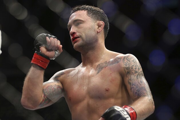 Frankie Edgar celebrates his win over Cub Swanson during the third round of their UFC mixed martial arts featherweight bout early Sunday, April 22, 2018, in Atlantic City, N.J. (AP Photo/Mel Evans) Frankie Edgar celebrates his win over Cub Swanson during the third round of their UFC mixed martial arts featherweight bout early Sunday, April 22, 2018, in Atlantic City, N.J. (AP Photo/Mel Evans)