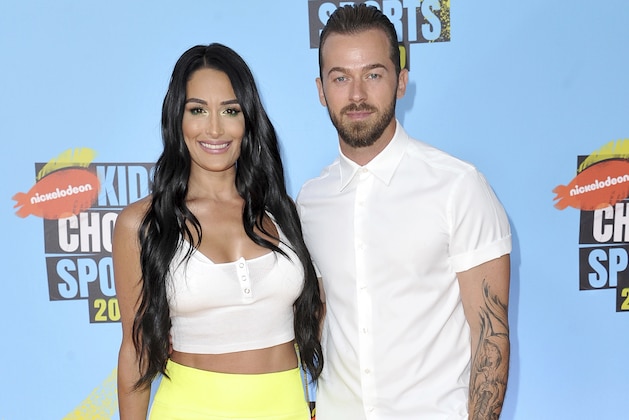 Nikki Bella, left, and Artem Chigvintsev arrive at the Kids' Choice Sports Awards on Thursday, July 11, 2019, at the Barker Hangar in Santa Monica, Calif. (Photo by Richard Shotwell/Invision/AP)