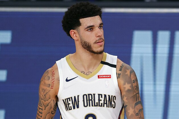 New Orleans Pelicans' Lonzo Ball looks on against the Sacramento Kings during the first half of an NBA basketball game Tuesday, Aug. 11, 2020, in Lake Buena Vista, Fla. (Mike Ehrmann/Pool Photo via AP)