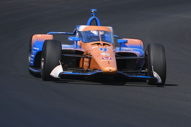 Scott Dixon, of New Zealand, drives into the first turn during the final practice session for the Indianapolis 500 IndyCar auto race at the Indianapolis Motor Speedway, Friday, Aug. 21, 2020 in Indianapolis. (AP Photo/AJ Mast)