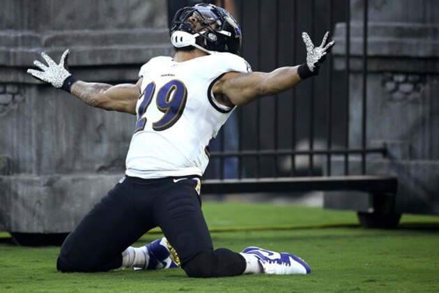 Baltimore Ravens free safety Earl Thomas reacts while being introduced onto the field prior to a NFL football preseason game against the Green Bay Packers, Thursday, Aug. 15, 2019, in Baltimore. (AP Photo/Nick Wass)