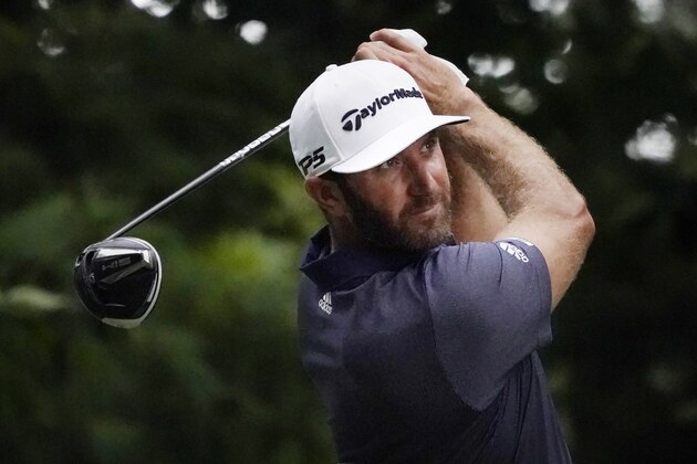 Dustin Johnson tees off on the ninth hole during the third round of the Northern Trust golf tournament at TPC Boston, Saturday, Aug. 22, 2020, in Norton, Mass. (AP Photo/Charles Krupa)