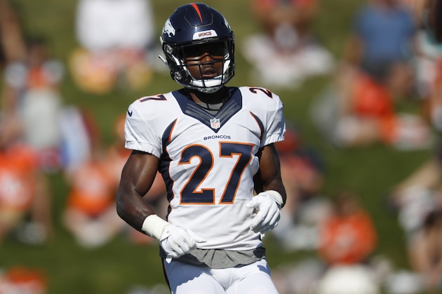 Denver Broncos running back Theo Riddick (27) takes part in drills during an NFL football training camp session Monday, Aug. 5, 2019, in Englewood, Colo. (AP Photo/David Zalubowski) Denver Broncos running back Theo Riddick (27) takes part in drills during an NFL football training camp session Monday, Aug. 5, 2019, in Englewood, Colo. (AP Photo/David Zalubowski)