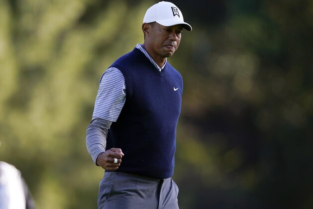 Tiger Woods fist pumps after making a putt for birdie on the 12th hole during the third round of the Genesis Open golf tournament at Riviera Country Club on Saturday, Feb. 16, 2019, in the Pacific Palisades area of Los Angeles. (AP Photo/Ryan Kang) Tiger Woods fist pumps after making a putt for birdie on the 12th hole during the third round of the Genesis Open golf tournament at Riviera Country Club on Saturday, Feb. 16, 2019, in the Pacific Palisades area of Los Angeles. (AP Photo/Ryan Kang)
