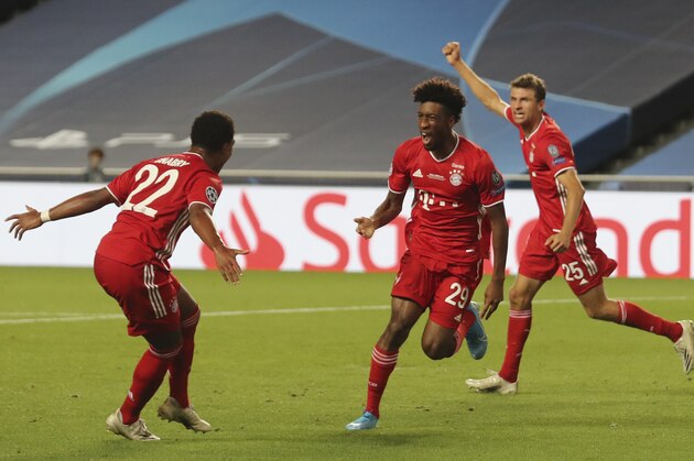Bayern's Kingsley Coman, center, celebrates with teammate Thomas Mueller, right, and Serge Gnabry after scoring his sides first goal during the Champions League final soccer match between Paris Saint-Germain and Bayern Munich at the Luz stadium in Lisbon, Portugal, Sunday, Aug. 23, 2020. (Miguel A. Lopes/Pool via AP)