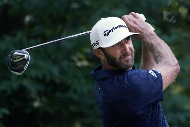 Dustin Johnson tees off on the ninth hole during the final round of the Northern Trust golf tournament at TPC Boston, Sunday, Aug. 23, 2020, in Norton, Mass. (AP Photo/Charles Krupa) Dustin Johnson tees off on the ninth hole during the final round of the Northern Trust golf tournament at TPC Boston, Sunday, Aug. 23, 2020, in Norton, Mass. (AP Photo/Charles Krupa)