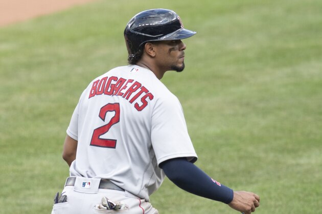 Boston Red Sox's Xander Bogaerts (2) leads from third base during the sixth inning of a baseball game against the Baltimore Orioles , Sunday, Aug. 23, 2020, in Baltimore. (AP Photo/Tommy Gilligan)