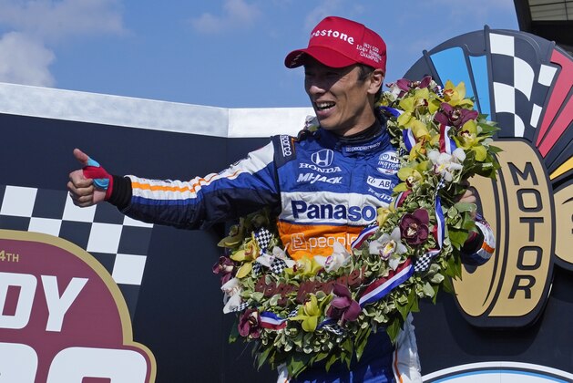 Takuma Sato, of Japan, celebrates after winning the Indianapolis 500 auto race at Indianapolis Motor Speedway, Sunday, Aug. 23, 2020, in Indianapolis. (AP Photo/Michael Conroy)