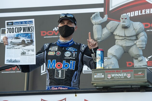 Kevin Harvick celebrates after winning a NASCAR Cup Series auto race at Dover International Speedway, Sunday, Aug. 23, 2020, in Dover, Del. (AP Photo/Jason Minto)