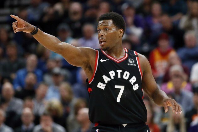 FILE - In this March 9, 2020, file photo, Toronto Raptors guard Kyle Lowry (7) directs his team during the first half during an NBA basketball game against the Utah Jazz in Salt Lake City. The defending NBA champions enter the NBA restart sitting second in the Eastern Conference. (AP Photo/Rick Bowmer, File) FILE - In this March 9, 2020, file photo, Toronto Raptors guard Kyle Lowry (7) directs his team during the first half during an NBA basketball game against the Utah Jazz in Salt Lake City. The defending NBA champions enter the NBA restart sitting second in the Eastern Conference. (AP Photo/Rick Bowmer, File)