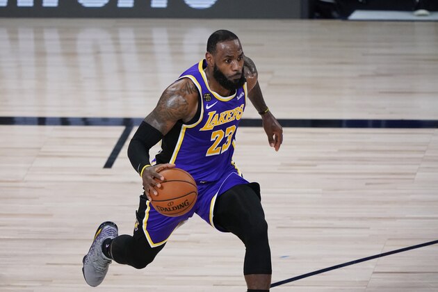 Los Angeles Lakers forward LeBron James (23) drives against the Portland Trail Blazers during the first half of an NBA basketball first round playoff game, Saturday, Aug. 22, 2020, in Lake Buena Vista, Fla. (AP Photo/Ashley Landis, Pool)