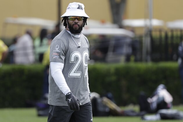 AFC free safety Earl Thomas, of the Baltimore Ravens, walks the field during a practice for the NFL Pro Bowl football game Thursday, Jan. 23, 2020, in Kissimmee, Fla. (AP Photo/John Raoux)