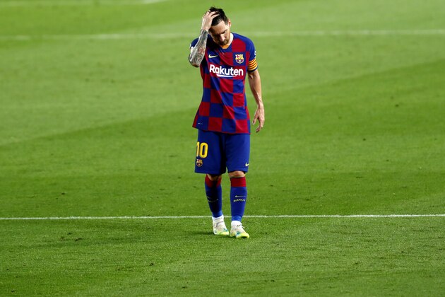 Barcelona's Lionel Messi reacts after the end of a Spanish La Liga soccer match between Barcelona and Osasuna at the Camp Nou stadium in Barcelona, Spain, Thursday, July 16, 2020. (AP Photo/Joan Monfort)