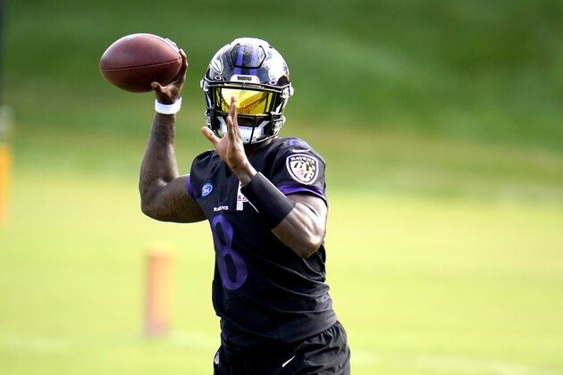 Baltimore Ravens quarterback Lamar Jackson works out during an NFL football training camp practice, Monday, Aug. 24, 2020, in Owings Mills, Md. (AP Photo/Julio Cortez)