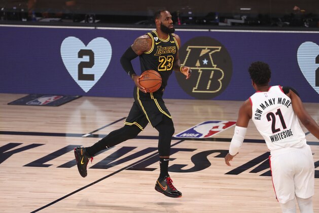 Los Angeles Lakers forward LeBron James (23) drives downcourt against the Portland Trail Blazers in Game 4 of an NBA basketball first-round playoff series, Monday, Aug. 24, 2020, in Lake Buena Vista, Fla. (Kim Klement/Pool Photo via AP)