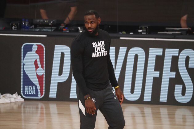 Los Angeles Lakers forward LeBron James looks on before Game 4 of an NBA basketball first-round playoff series against the Portland Trail Blazers, Monday, Aug. 24, 2020, in Lake Buena Vista, Fla. (Kim Klement/Pool Photo via AP)