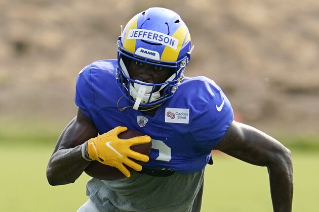 Los Angeles Rams wide receiver Van Jefferson (12) goes through drills during an NFL football camp practice Tuesday, Aug. 18, 2020, in Thousand Oaks, Calif. (AP Photo/Marcio Jose Sanchez)
