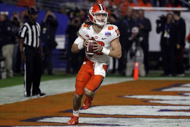 Clemson quarterback Trevor Lawrence (16) during the first half of the Fiesta Bowl NCAA college football game against Ohio State, Saturday, Dec. 28, 2019, in Glendale, Ariz. (AP Photo/Rick Scuteri).
