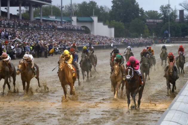 Luis Saez rides Maximum Security across the finish line first followed by Flavien Prat on Country House during the 145th running of the Kentucky Derby horse race at Churchill Downs Saturday, May 4, 2019, in Louisville, Ky. Country House was declared the winner after Maximum Security was disqualified following a review by race stewards. (AP Photo/Matt Slocum)