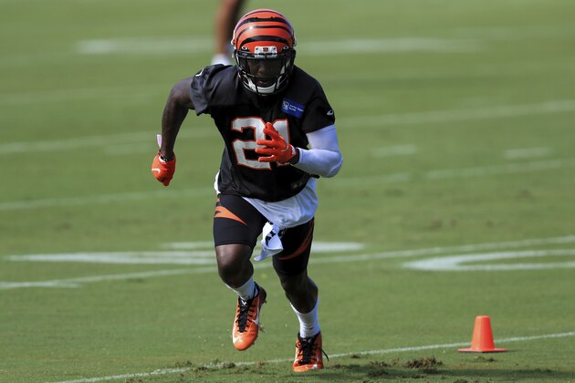 Cincinnati Bengals' Mackensie Alexander (21) runs a drill during an NFL football camp practice in Cincinnati, Monday, Aug. 17, 2020. (AP Photo/Aaron Doster)